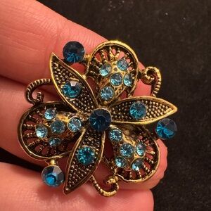 Elegant Gold and Blue Floral Brooch